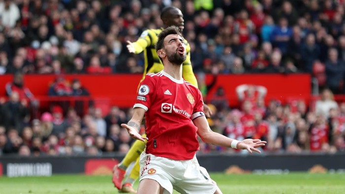 MANCHESTER, ENGLAND - FEBRUARY 26: Bruno Fernandes of Manchester United reacts after a missed chance during the Premier League match between Manchester United and Watford at Old Trafford on February 26, 2022 in Manchester, England. (Photo by Jan Kruger/Getty Images)