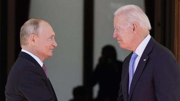 FILE - President Joe Biden and Russian President Vladimir Putin, arrive to meet at the 'Villa la Grange', in Geneva, Switzerland, June 16, 2021.  (AP Photo/Patrick Semansky, File)