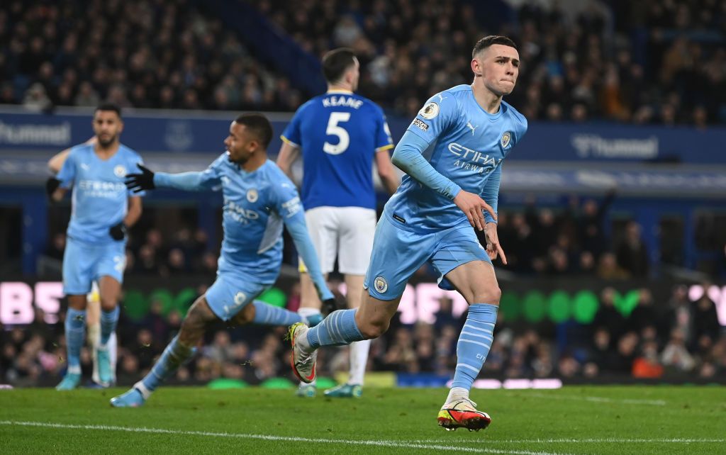 LIVERPOOL, ENGLAND - FEBRUARY 26: Phil Foden of Manchester City celebrates after scoring their team's first goal during the Premier League match between Everton and Manchester City at Goodison Park on February 26, 2022 in Liverpool, England. (Photo by Michael Regan/Getty Images)