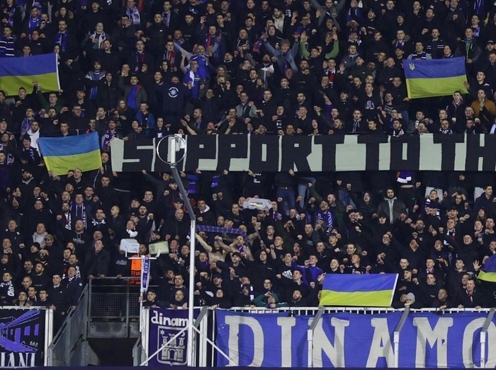 Soccer Football - Europa League - Play Off Second Leg - Dinamo Zagreb v Sevilla - Stadion Maksimir, Zagreb, Croatia - February 24, 2022 Fans display Ukraine flags inside the stadium before the match REUTERS/Borut Zivulovic