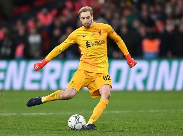 LONDON, ENGLAND - FEBRUARY 27: Caoimhin Kelleher of Liverpool scores their teams eleventh penalty in the penalty shoot out during the Carabao Cup Final match between Chelsea and Liverpool at Wembley Stadium on February 27, 2022 in London, England. (Photo by Shaun Botterill/Getty Images)