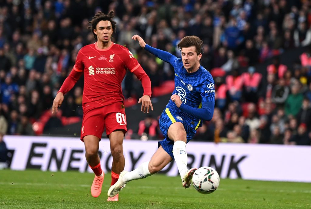 LONDON, ENGLAND - FEBRUARY 27: Mason Mount of Chelsea shoots under pressure from Trent Alexander-Arnold of Liverpool  during the Carabao Cup Final match between Chelsea and Liverpool at Wembley Stadium on February 27, 2022 in London, England. (Photo by Shaun Botterill/Getty Images)