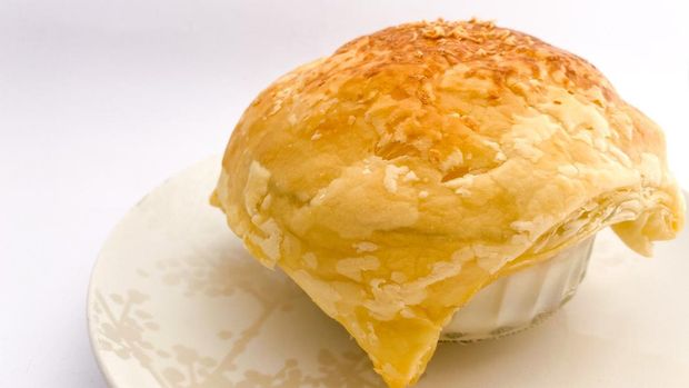 Zuppa soup is a bowl of Thick milky chicken and vegetables soup covered by crispy pastry