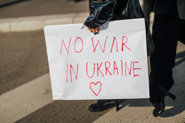 protest the Russian invasion of Ukraine at Milan Fashion Week