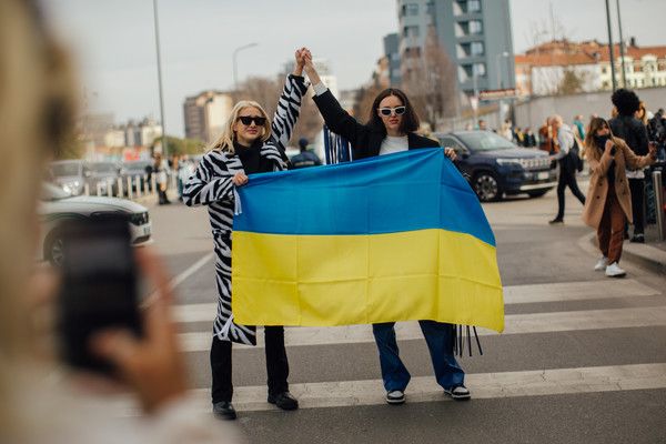protest the Russian invasion of Ukraine at Milan Fashion Week