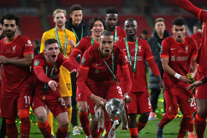 LONDON, ENGLAND - FEBRUARY 27: Fabinho of Liverpool celebrates with The Carabao Cup trophy following their sides victory during the Carabao Cup Final match between Chelsea and Liverpool at Wembley Stadium on February 27, 2022 in London, England. (Photo by Michael Regan/Getty Images)