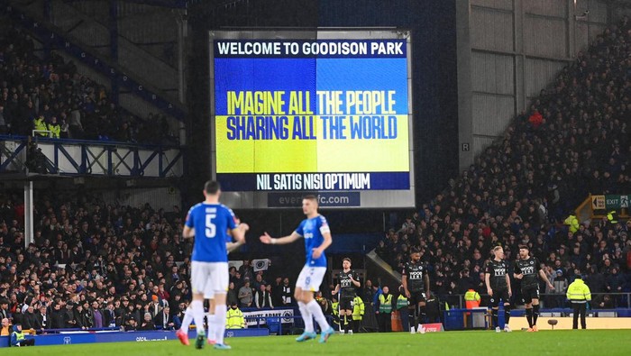 LIVERPOOL, ENGLAND - MARCH 03: A message with the Ukrainian flag is displayed on the LED board to indicate peace and sympathy with Ukraine prior to the Emirates FA Cup Fifth Round match between Everton and Boreham Wood at Goodison Park on March 03, 2022 in Liverpool, England. (Photo by Stu Forster/Getty Images)