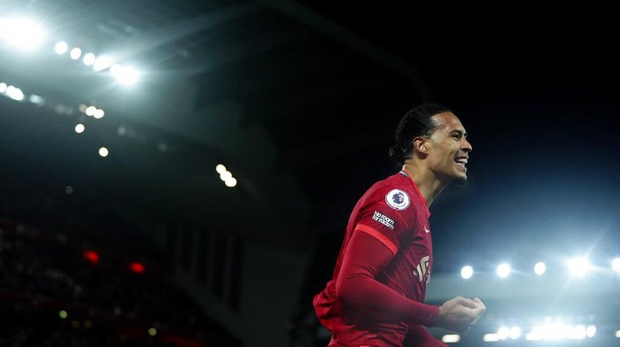 Liverpools Virgil van Dijk celebrates after scoring against Leeds United during the English Premier League soccer match between Liverpool and Leeds United at Anfield stadium in Liverpool, England, Wednesday, Feb. 23, 2022. (AP Photo/Jon Super)