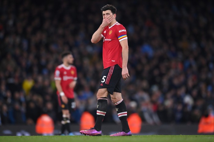 MANCHESTER, ENGLAND - MARCH 06: Harry Maguire of Manchester United looks dejected following their sides defeat after the Premier League match between Manchester City and Manchester United at Etihad Stadium on March 06, 2022 in Manchester, England. (Photo by Laurence Griffiths/Getty Images)