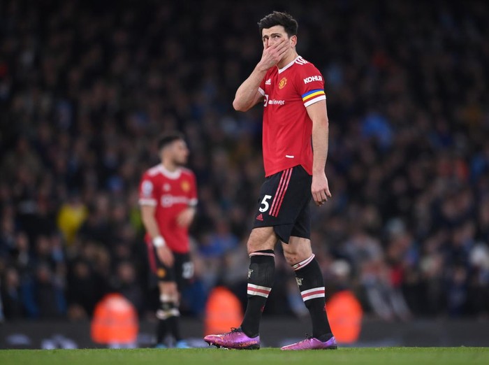MANCHESTER, ENGLAND - MARCH 06: Harry Maguire of Manchester United looks dejected following their sides defeat after the Premier League match between Manchester City and Manchester United at Etihad Stadium on March 06, 2022 in Manchester, England. (Photo by Laurence Griffiths/Getty Images)