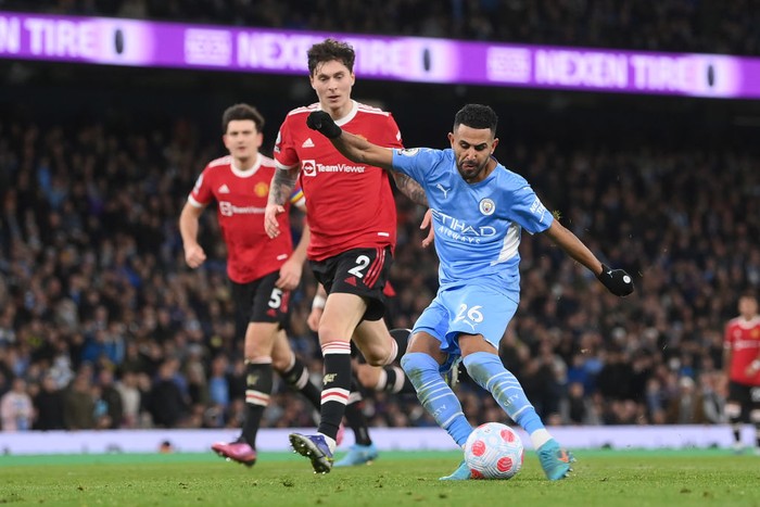 Harry Maguire, Manchester City MANCHESTER, ENGLAND - MARCH 06: Harry Maguire of Manchester United looks dejected during the Premier League match between Manchester City and Manchester United at Etihad Stadium on March 06, 2022 in Manchester, England. (Photo by Michael Regan/Getty Images)