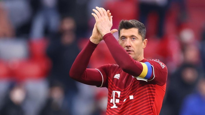 MUNICH, GERMANY - MARCH 05: Robert Lewandowski of Muenchen reacts after the Bundesliga match between FC Bayern München and Bayer 04 Leverkusen at Allianz Arena on March 05, 2022 in Munich, Germany. (Photo by Alex Grimm/Getty Images)