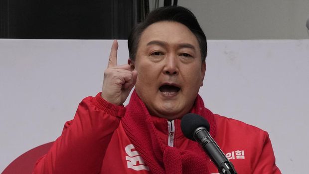Yoon Suk Yeol, the presidential candidate of the main opposition People Power Party, speaks during a presidential election campaign in Seoul, South Korea on Feb. 15, 2022. An unusually bitter election season in South Korea culminates on Wednesday, March 9 when tens of millions of voters pick their next president. The winner, who will be sworn into office in May and serve one five-year term, will face crucial challenges as the leader of a fast-aging nation that's grappling with economic inequalities, soaring debt and a growing North Korean nuclear threat. (AP Photo/Ahn Young-joon)