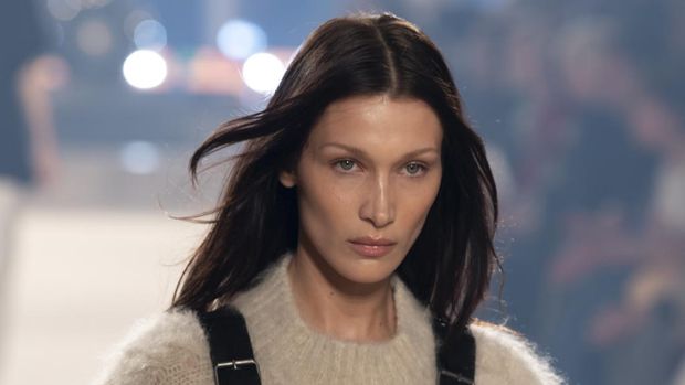 PARIS, FRANCE - MARCH 03: (EDITORIAL USE ONLY - For Non-Editorial use please seek approval from Fashion House) Bella Hadid walks the runway with models during the Isabel Marant  Womenswear Fall/Winter 2022-2023 show as part of Paris Fashion Week on March 03, 2022 in Paris, France. (Photo by Kristy Sparow/Getty Images)