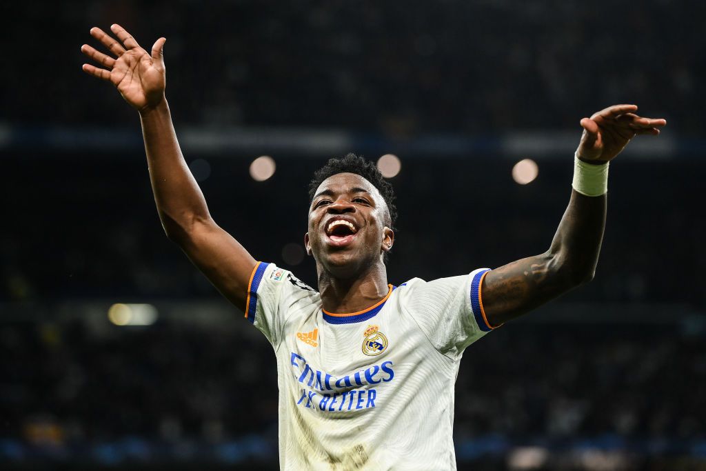 MADRID, SPAIN - MARCH 09: Vinicius Jr of Real Madrid CF celebrates at the end of the UEFA Champions League Round Of Sixteen Leg Two match between Real Madrid and Paris Saint-Germain at Estadio Santiago Bernabeu on March 09, 2022 in Madrid, Spain. (Photo by David Ramos/Getty Images)