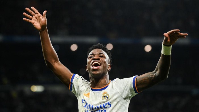 Vinicius Jr MADRID, SPAIN - MARCH 09: Vinicius Jr of Real Madrid CF celebrates at the end of the UEFA Champions League Round Of Sixteen Leg Two match between Real Madrid and Paris Saint-Germain at Estadio Santiago Bernabeu on March 09, 2022 in Madrid, Spain. (Photo by David Ramos/Getty Images)