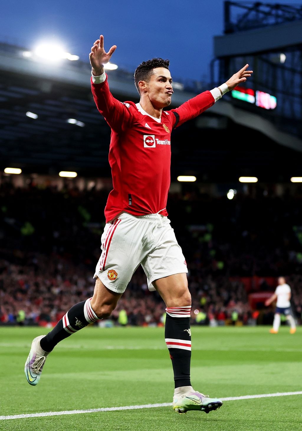 MANCHESTER, ENGLAND - MARCH 12: Cristiano Ronaldo of Manchester United celebrates after scoring their side's second goal during the Premier League match between Manchester United and Tottenham Hotspur at Old Trafford on March 12, 2022 in Manchester, England. (Photo by Naomi Baker/Getty Images)