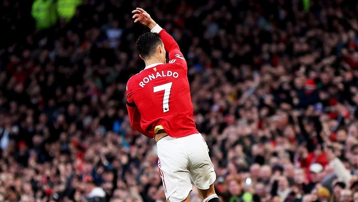 MANCHESTER, ENGLAND - MARCH 12: Cristiano Ronaldo of Manchester United celebrates after scoring their sides first goal during the Premier League match between Manchester United and Tottenham Hotspur at Old Trafford on March 12, 2022 in Manchester, England. (Photo by Naomi Baker/Getty Images)