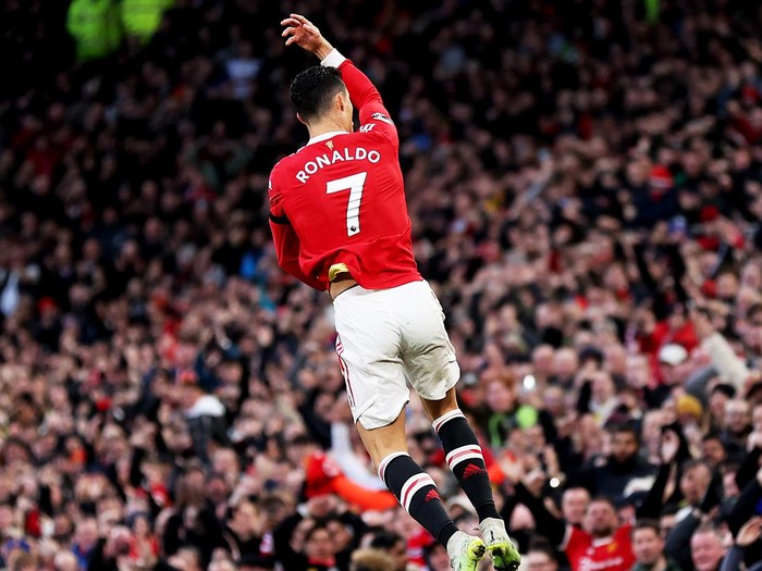 MANCHESTER, ENGLAND - MARCH 12: Cristiano Ronaldo of Manchester United celebrates after scoring their side's first goal during the Premier League match between Manchester United and Tottenham Hotspur at Old Trafford on March 12, 2022 in Manchester, England. (Photo by Naomi Baker/Getty Images)