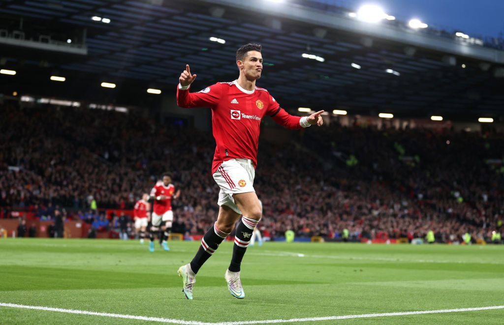 MANCHESTER, ENGLAND - MARCH 12: Cristiano Ronaldo of Manchester United celebrates after scoring their side's second goal during the Premier League match between Manchester United and Tottenham Hotspur at Old Trafford on March 12, 2022 in Manchester, England. (Photo by Naomi Baker/Getty Images)