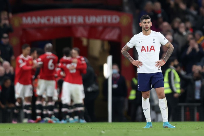 MANCHESTER, ENGLAND - MARCH 12: Cristian Romero of Tottenham Hotspur looks on dejected after their side concedes their third goal scored by Cristiano Ronaldo of Manchester United (not pictured) during the Premier League match between Manchester United and Tottenham Hotspur at Old Trafford on March 12, 2022 in Manchester, England. (Photo by Naomi Baker/Getty Images)