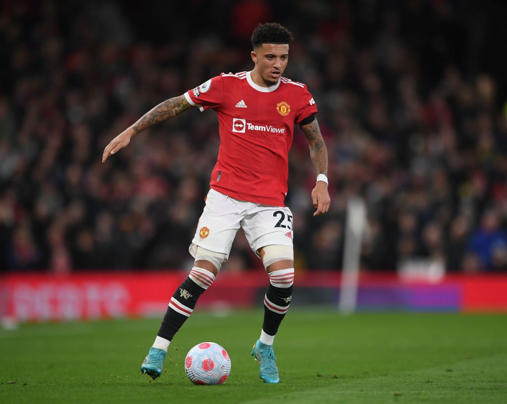 MANCHESTER, ENGLAND - MARCH 12: Jadon Sancho of Manchester United in action during the Premier League match between Manchester United and Tottenham Hotspur at Old Trafford on March 12, 2022 in Manchester, England. (Photo by Michael Regan/Getty Images)