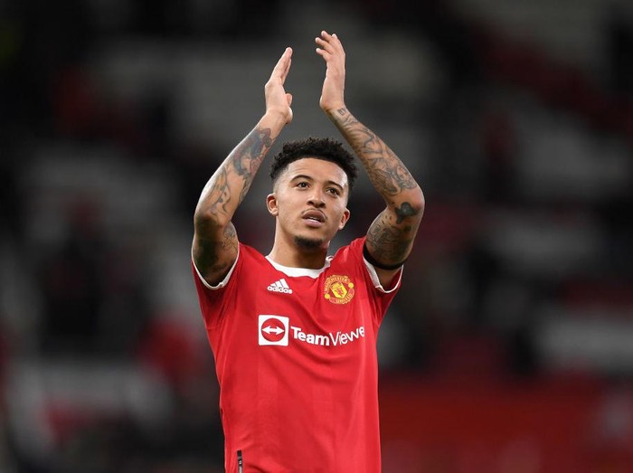MANCHESTER, ENGLAND - MARCH 12: Jadon Sancho of Manchester United in action during the Premier League match between Manchester United and Tottenham Hotspur at Old Trafford on March 12, 2022 in Manchester, England. (Photo by Michael Regan/Getty Images)