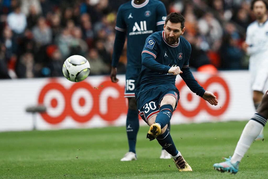 PSG's Lionel Messi makes an attempt to score during the French League One soccer match between Paris Saint-Germain and Bordeaux at the Parc des Princes stadium in Paris, France, Sunday, March 13, 2022. (AP Photo/Thibault Camus)