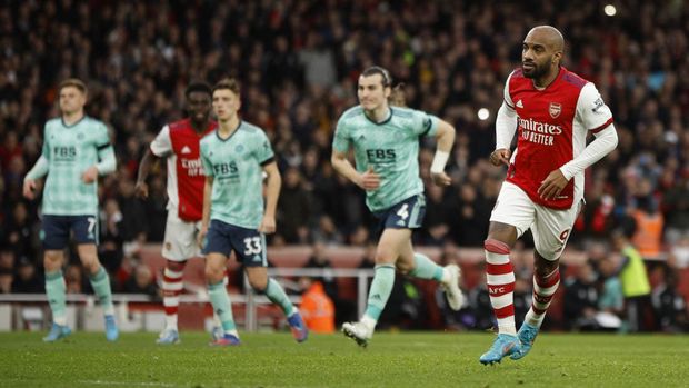 Soccer Football - Premier League - Arsenal v Leicester City - Emirates Stadium, London, Britain - March 13, 2022 Arsenal's Alexandre Lacazette celebrates scoring their second goal Action Images via Reuters/John Sibley EDITORIAL USE ONLY. No use with unauthorized audio, video, data, fixture lists, club/league logos or 'live' services. Online in-match use limited to 75 images, no video emulation. No use in betting, games or single club /league/player publications.  Please contact your account representative for further details.