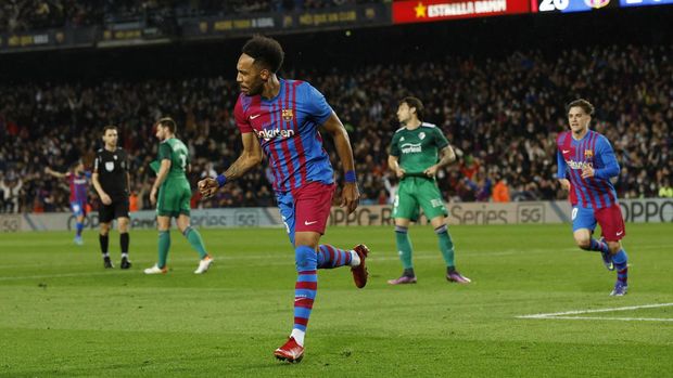 SOCCER-SPAIN-FCB-OSA/REPORT Soccer Football - LaLiga - FC Barcelona v Osasuna - Camp Nou, Barcelona, Spain - March 13, 2022 FC Barcelona's Pierre-Emerick Aubameyang celebrates scoring their third goal REUTERS/Albert Gea