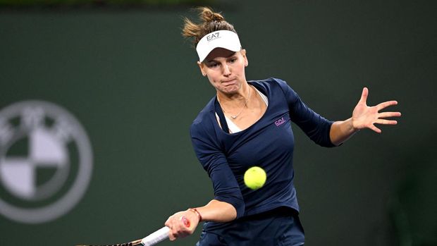 Mar 12, 2022; Indian Wells, CA, USA; Veronika Kudermetova (RUS) hits a shot during her 2nd round match against Naomi Osaka (JPN) at the BNP Paribas Open at the Indian Wells Tennis Garden. Mandatory Credit: Jayne Kamin-Oncea-USA TODAY Sports