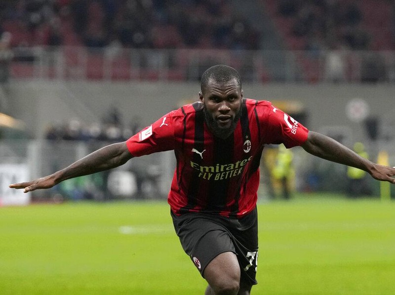 AC Milan's Franck Kessie celebrates after scoring his side's fourth goal during the Italian Cup quarter final match between AC Milan and Lazio at the San Siro stadium, in Milan, Italy, Wednesday, Feb. 9, 2022. (AP Photo/Antonio Calanni)