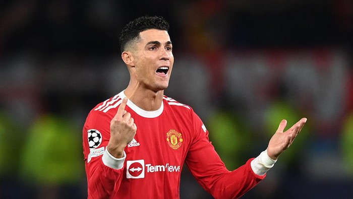 MANCHESTER, ENGLAND - MARCH 15: Cristiano Ronaldo of Manchester United reacts after Renan Lodi of Atletico Madrid (not pictured) scored their sides first goal during the UEFA Champions League Round Of Sixteen Leg Two match between Manchester United and Atletico Madrid at Old Trafford on March 15, 2022 in Manchester, England. (Photo by Shaun Botterill/Getty Images)
