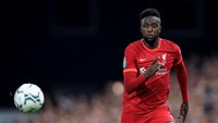 Nama pertama yang pergi adalah Divock Origi. Penyerang Belgia itu cabut usai kontraknya habis bulan ini dan dilaporkan akan segera bergabung dengan AC Milan. Foto: Getty Images/Stephen Pond