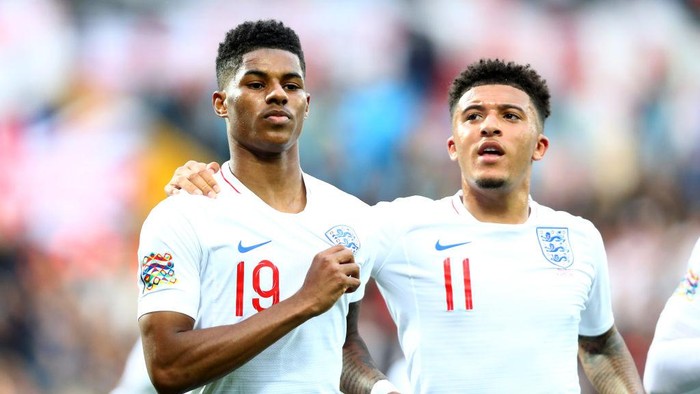 GUIMARAES, PORTUGAL - JUNE 06:  Marcus Rashford of England celebrates as he scores his teams first goal from a penalty with Jadon Sancho during the UEFA Nations League Semi-Final match between the Netherlands and England at Estadio D. Afonso Henriques on June 06, 2019 in Guimaraes, Portugal. (Photo by Dean Mouhtaropoulos/Getty Images)