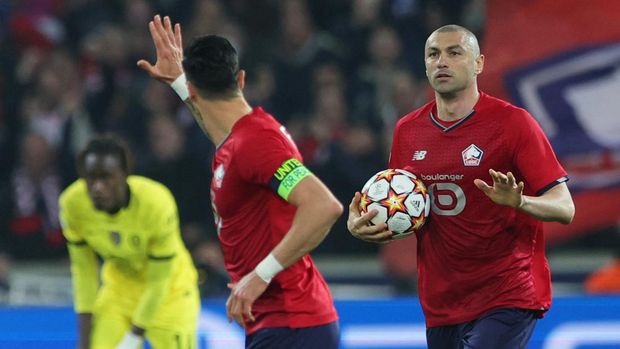 Soccer Football - Champions League - Lille v Chelsea - Stade Pierre-Mauroy, Villeneuve-d'Ascq, France - March 16, 2022 Lille's Burak Yilmaz celebrates scoring their first goal REUTERS/Pascal Rossignol