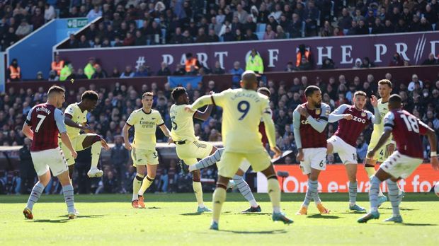 Soccer Football - Premier League - Aston Villa v Arsenal - Villa Park, Birmingham, Britain - March 19, 2022 Arsenal's Bukayo Saka scores their first goal Action Images via Reuters/Carl Recine EDITORIAL USE ONLY. No use with unauthorized audio, video, data, fixture lists, club/league logos or 'live' services. Online in-match use limited to 75 images, no video emulation. No use in betting, games or single club /league/player publications.  Please contact your account representative for further details.