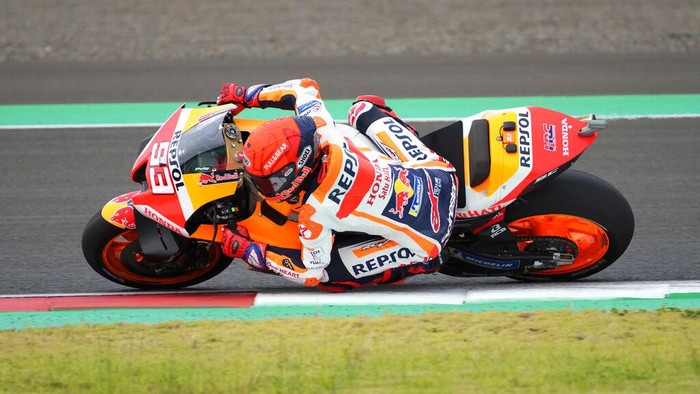 Spanish rider Marc Marquez of Repsol Honda Team in leans into a corner during the qualifying laps at the Pertamina Mandalika Circuit in Mandalika, Lombok Island, Indonesia, Saturday, March 19, 2022. (AP Photo/Achmad Ibrahim)