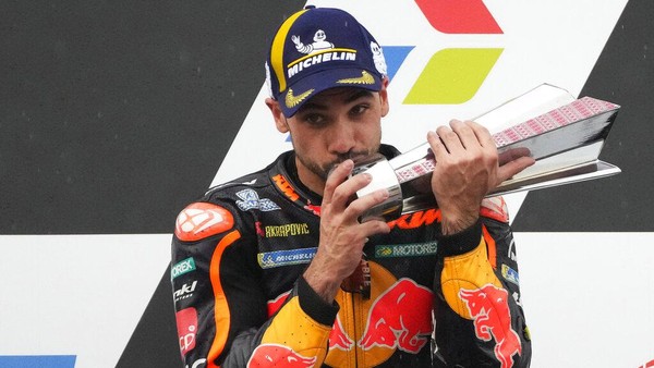 Portugals rider Miguel Aliveira of Red Bull KTM Factory Racing celebrates victory after winning the Moto GP Pertamina Grand Prix of Indonesia at Pertamina Mandalika Circuit in Mandalika, Lombok Island, Indonesia, Sunday, March 20, 2022.(AP Photo/Achmad Ibrahim)