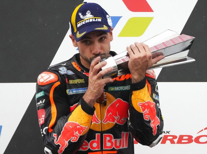 Portugals rider Miguel Aliveira of Red Bull KTM Factory Racing celebrates victory after winning the Moto GP Pertamina Grand Prix of Indonesia at Pertamina Mandalika Circuit in Mandalika, Lombok Island, Indonesia, Sunday, March 20, 2022.(AP Photo/Achmad Ibrahim)