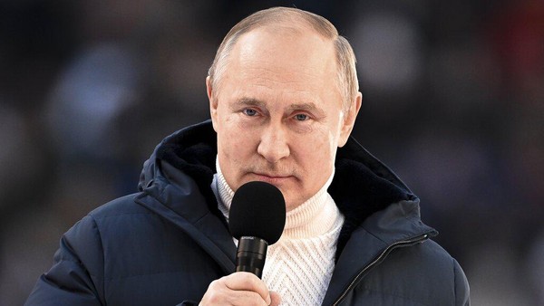 Russian President Vladimir Putin greets people after his speech at the concert marking the eighth anniversary of the referendum on the state status of Crimea and Sevastopol and its reunification with Russia, in Moscow, Russia, Friday, March 18, 2022. (Ramil Sitdikov/Sputnik Pool Photo via AP)