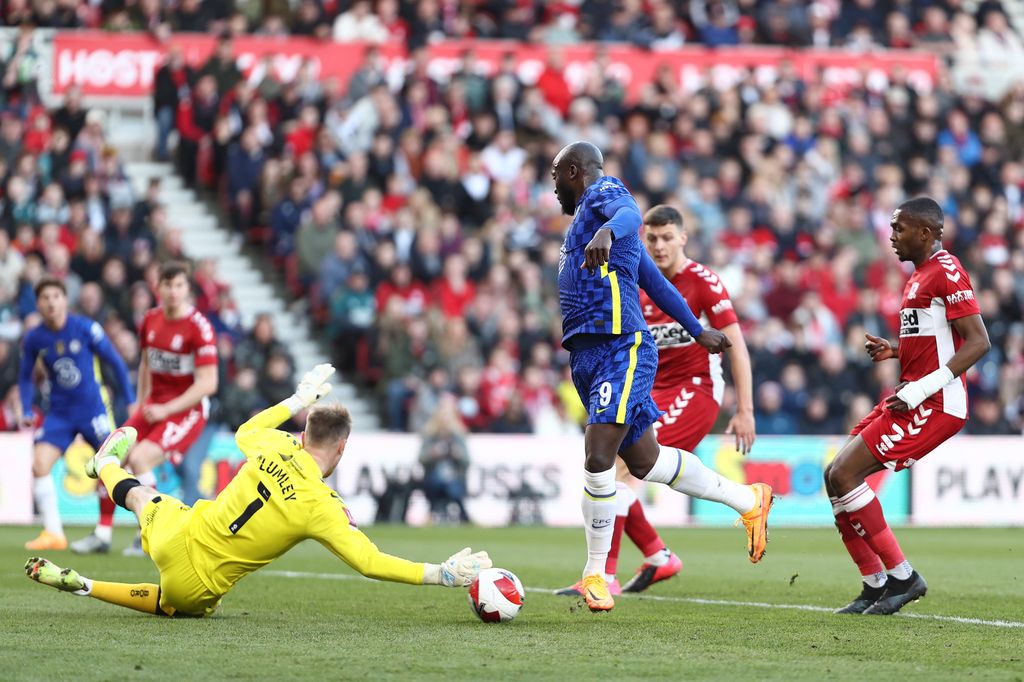 MIDDLESBROUGH, ENGLAND - MARCH 19: Romelu Lukaku of Chelsea scores their team's first goal past Joe Lumley of Middlesbrough during the Emirates FA Cup Quarter Final match between Middlesbrough v Chelsea at Riverside Stadium on March 19, 2022 in Middlesbrough, England. (Photo by Naomi Baker/Getty Images)