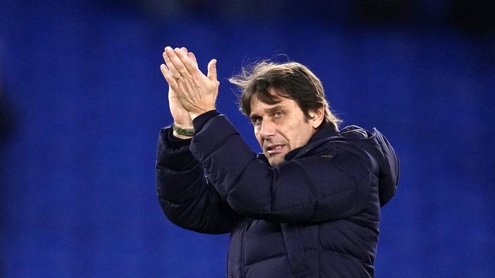 Tottenhams head coach Antonio Conte applauds to fans at the end of the English Premier League soccer match between Brighton and Tottenham Hotspur at the Falmer stadium in Brighton, England, Wednesday, March 16, 2022. (AP Photo/Matt Dunham)