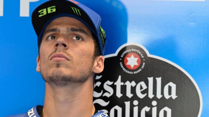 Joan Mir DOHA, QATAR - MARCH 05: Joan Mir of Spain and Team Suzuki ECSTAR looks on in box during the MotoGP of Qatar - Qualifying at Losail Circuit on March 05, 2022 in Doha, Qatar. (Photo by Mirco Lazzari gp/Getty Images,)