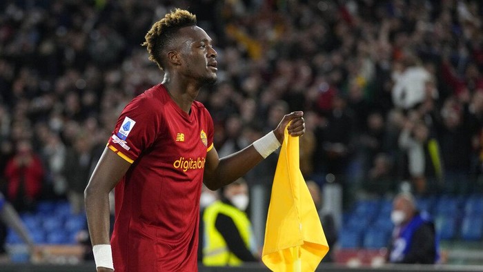 Romas Tammy Abraham celebrates after scoring his sides 2nd goal during a Serie A soccer match between Roma and Lazio at Romes Olympic stadium, Sunday, March 20, 2022. (AP Photo/Andrew Medichini)