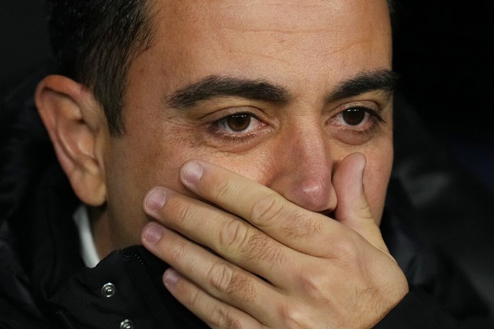 Xavi Hernandez Barcelona's head coach Xavi Hernandez gestures ahead a Spanish La Liga soccer match between Rial Madrid and FC Barcelona at the Santiago Bernabeu stadium in Madrid, Spain, Sunday, March 20, 2022. (AP Photo/Manu Fernandez)