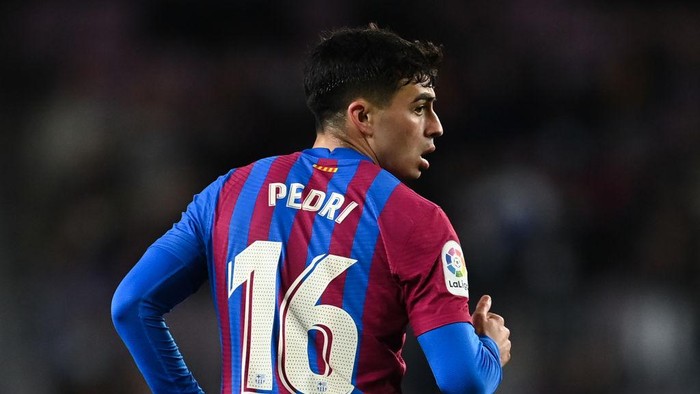 BARCELONA, SPAIN - MARCH 13: Pedri of FC Barcelona looks on during the LaLiga Santander match between FC Barcelona and CA Osasuna at Camp Nou on March 13, 2022 in Barcelona, Spain. (Photo by David Ramos/Getty Images)