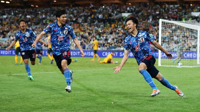 SYDNEY, AUSTRALIA - MARCH 24: Kaoru Mitoma of Japan celebrates scoring a goal during the FIFA World Cup Qatar 2022 AFC Asian Qualifying match between the Australia Socceroos and Japan at Accor Stadium on March 24, 2022 in Sydney, Australia. (Photo by Mark Metcalfe/Getty Images)