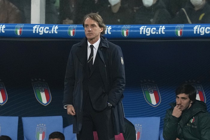 Italys manager Roberto Mancini stands on the bench during the World Cup qualifying play-off soccer match between Italy and North Macedonia, at Renzo Barbera stadium, in Palermo, Italy, Thursday, March 24, 2022. North Macedonia won 1-0. (AP Photo/Ant