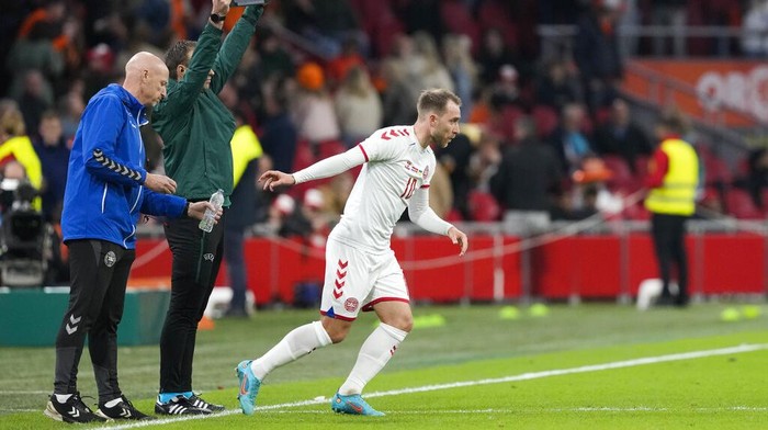 Denmarks Christian Eriksen enters the pitch as a substitute player during the international friendly soccer match between the Netherlands and Denmark at the Johan Cruyff ArenA in Amsterdam, Netherlands, Saturday, March 26, 2022. The match was Eriksens first appearance for Denmark since he collapsed after suffering a cardiac arrest during a European Championship game in June. The Netherlands-Denmark friendly was being played at Amsterdams Johan Cruyff Arena, where Eriksen made his name as a playmaker for Dutch club Ajax. (AP Photo/Peter Dejong)
